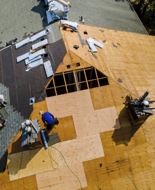 Homeowner performing a roof inspection with a simple checklist to find damage